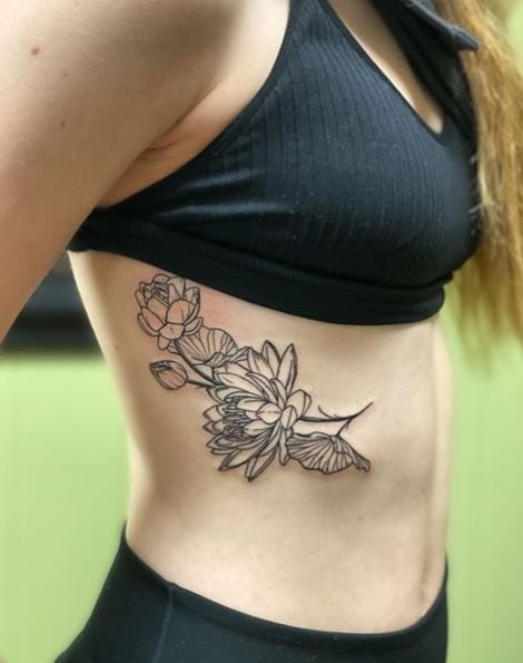 Traditional Water Lilies with Branches Ribs Tattoo