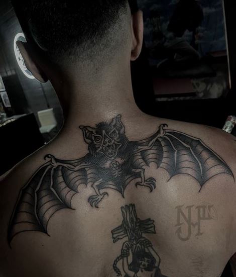 Cross and Bat Back Tattoo