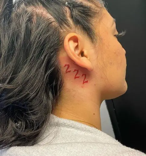 Red 222 Tattoo Behind the Ear
