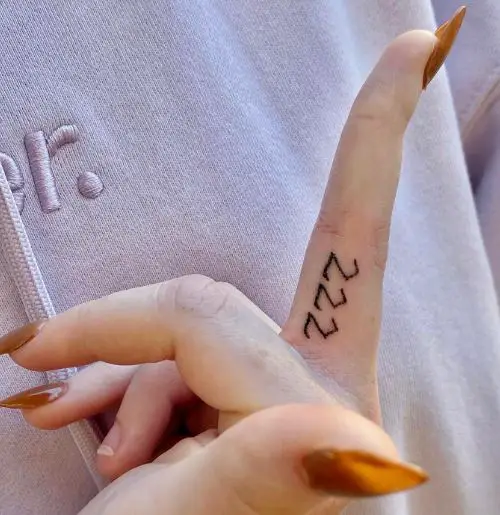 222 Line Tattoo on the Finger