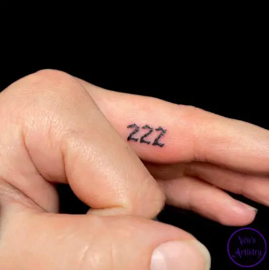 222 Tattoo on the Middle Finger