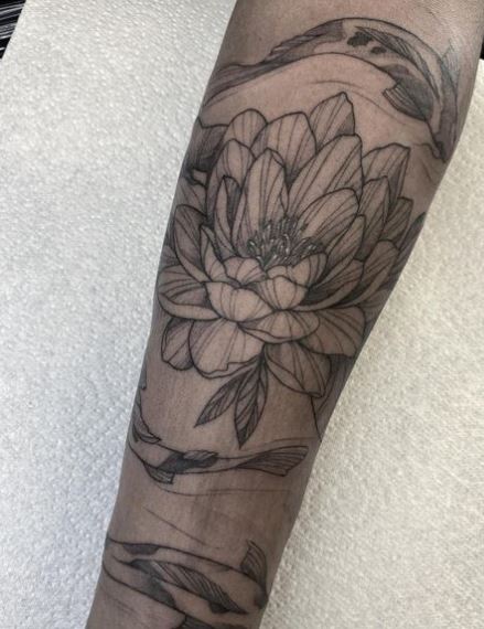 Koi Fish and Traditional Water Lily Knee Tattoo