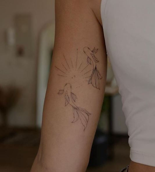 Minimalistic Koi Fishes Biceps Tattoo