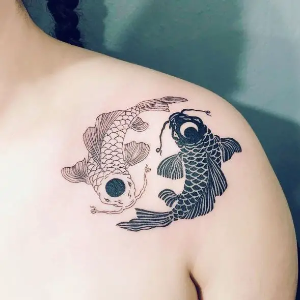 Black and White Koi Fishes Shoulder Tattoo