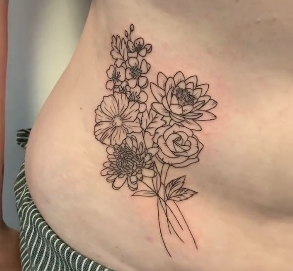 Line-Work Water Lily Bouquet Belly Tattoo