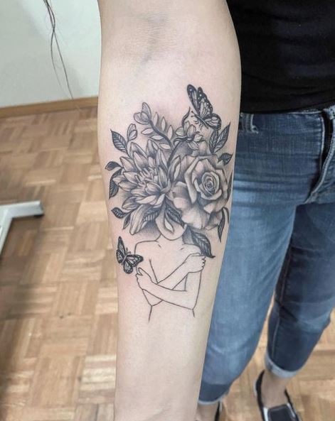 Butterfly with Rose and Water Lily Bouquet Arm Tattoo