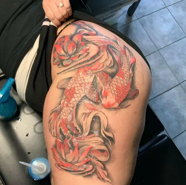 Lotus Flower and Red Koi Fish Hip Tattoo