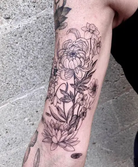 Black and Grey Water Lilies Bouquet Biceps Tattoo