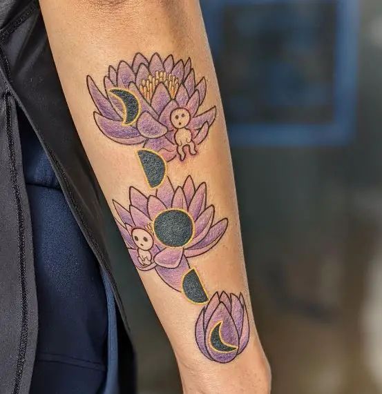 Moon Phases and Water Lily Life Stage Arm Tattoo