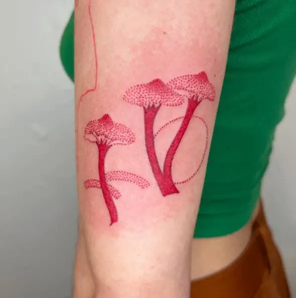 Red Mushrooms Tattoo on the Arm