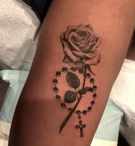 Simple Rose and Rosary Tattoo on Arm