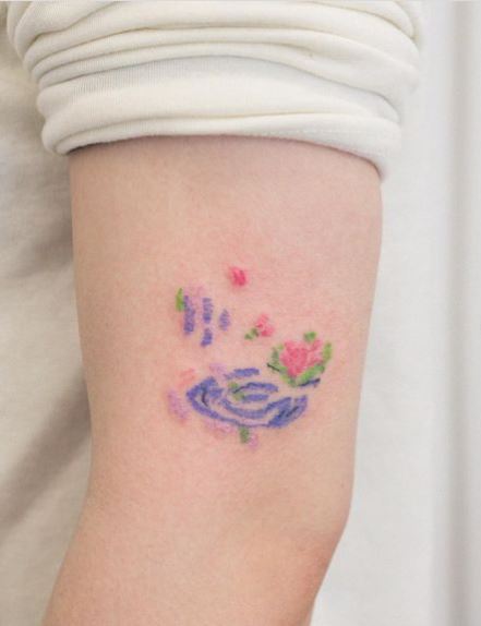 Minimalistic Colorful Water Lilies Arm Tattoo