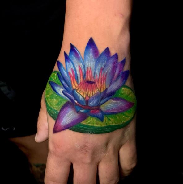 Blue Water Lily with Lily Pad Hand Tattoo