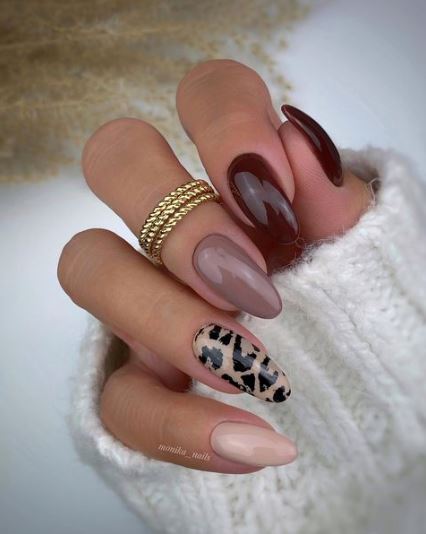 Animal Print With Varying Brown Nails