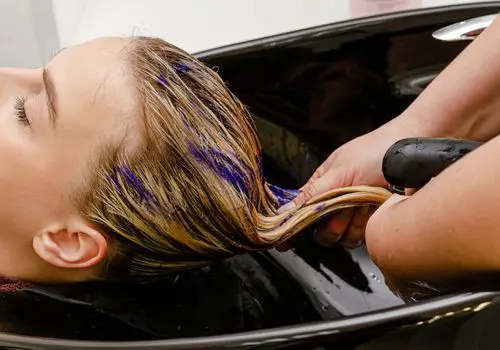 Applying Purple Shampoo on Golden Brown Hair