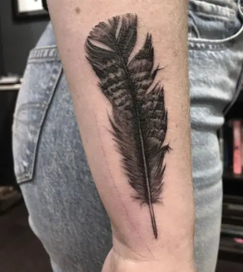 Baby turkey feather tattoo