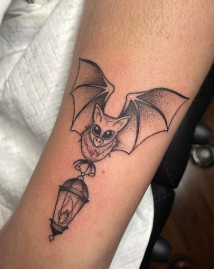 Bat with Lamp Arm Tattoo