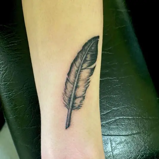Black Eagle Feather Tattoo Piece