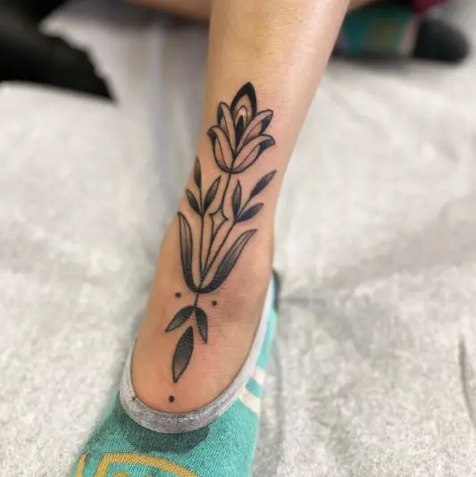 Black Flower Ornamental Leg Tattoo