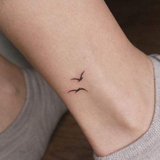 Black Twin Bird Tattoo For Legs