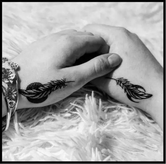 Black Two Angel Feather Tattoo