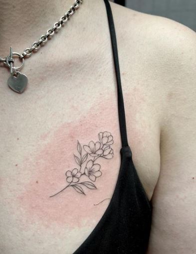 Blooming Flowers Tattoo On The Chest