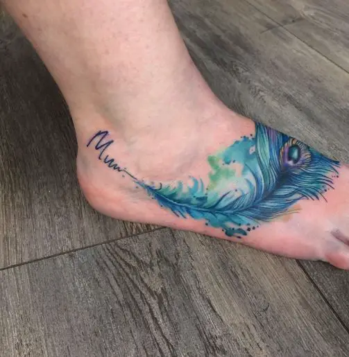 Blue Water Colored Peacock Feather Tattoo