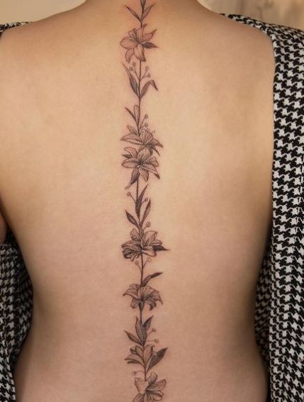 Chain of Flowers Spine Tattoo