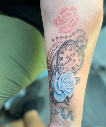 Clock with Blue Rose and Lip Stamp Tattoo
