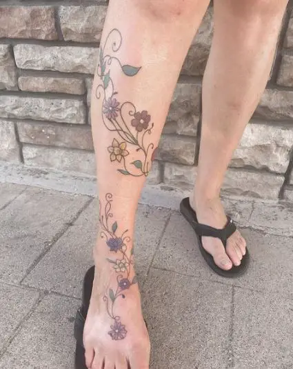 Colorful Flowers and Vines Leg Tattoo