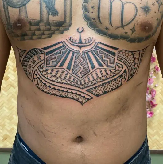 Contemporary Flow with a Filipino Sun Stomach Tattoo