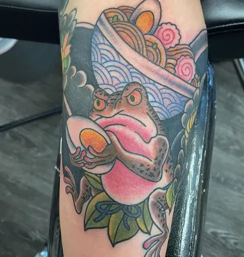 Egg thieving frog tattoo