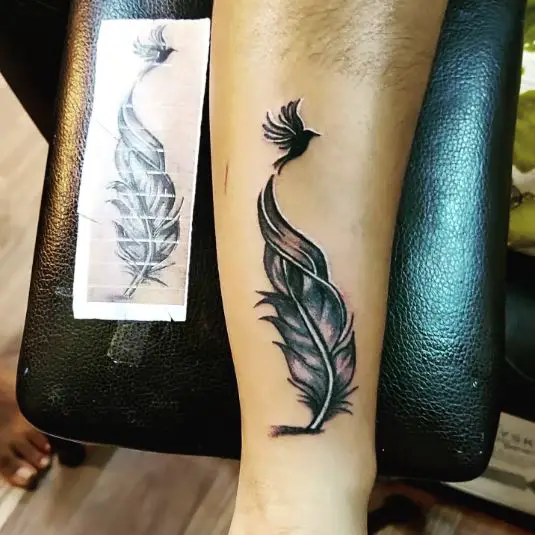 Feather Tattoo with Bird on Side Wrist