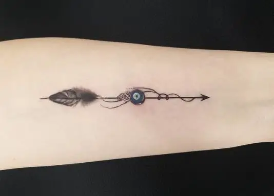 Feathers on an Arrow Tattoo