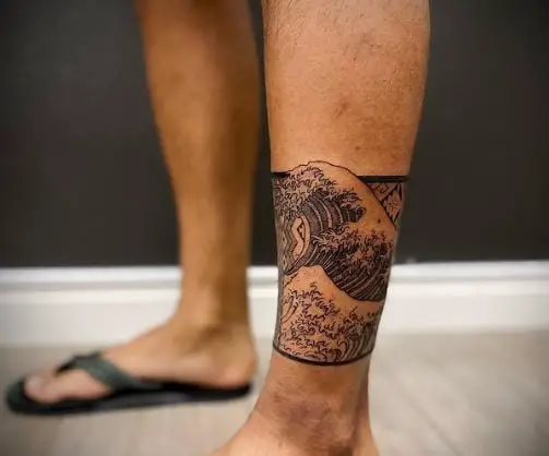 Filipino Tribal Calf Tattoo