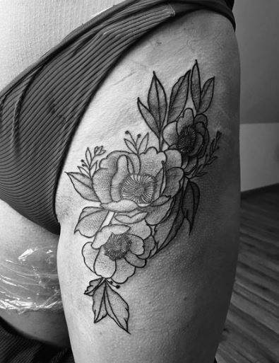 Hibiscus Flower Tattoo on the Thigh