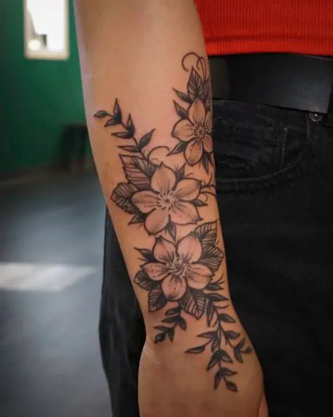 Drawn on Flowers Tattoo
