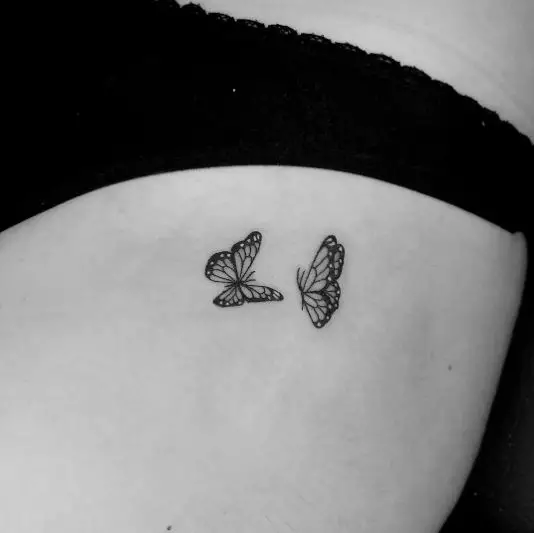 Flying Butterflies Tattoo on the Thigh 