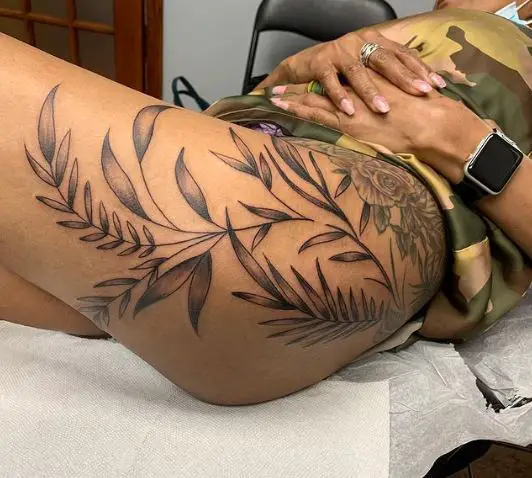 Free Hand Vines Tattoo on the Thigh