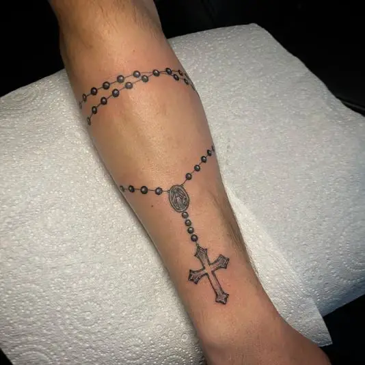 Free hand rosary beads tattoo