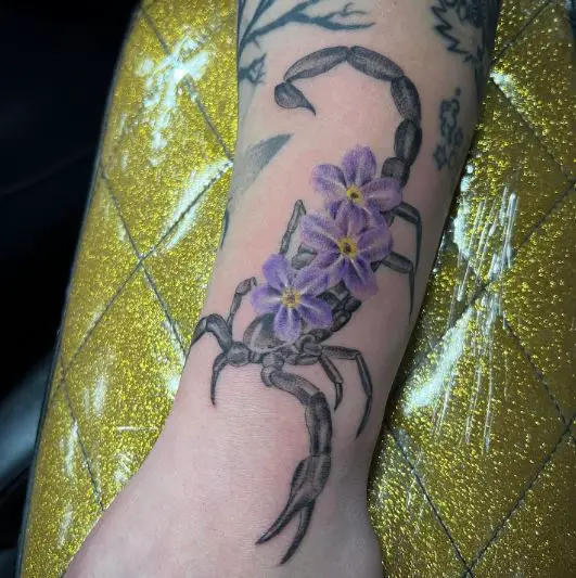 Fun Little Scorpion and Flowers Tattoo