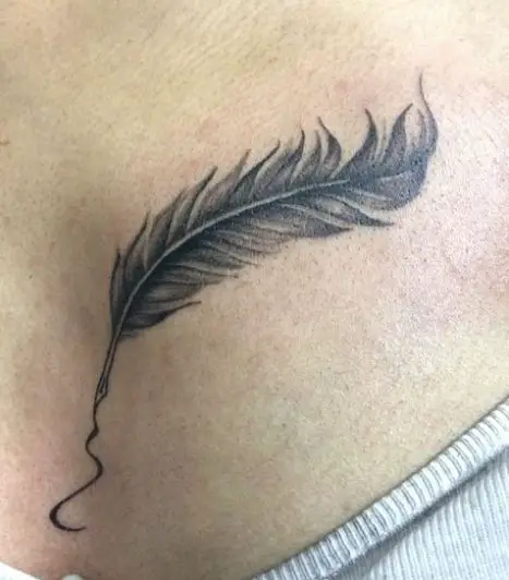 Grey Quill Chest Feather Tattoo