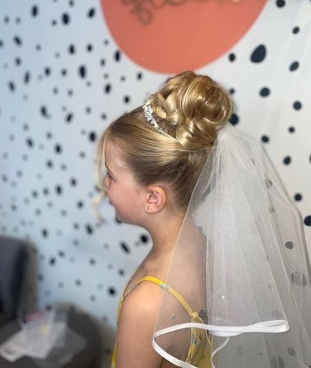 High Bun First Holy Communion Hairstyle