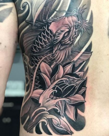 Koi dragon and lotus tattoo