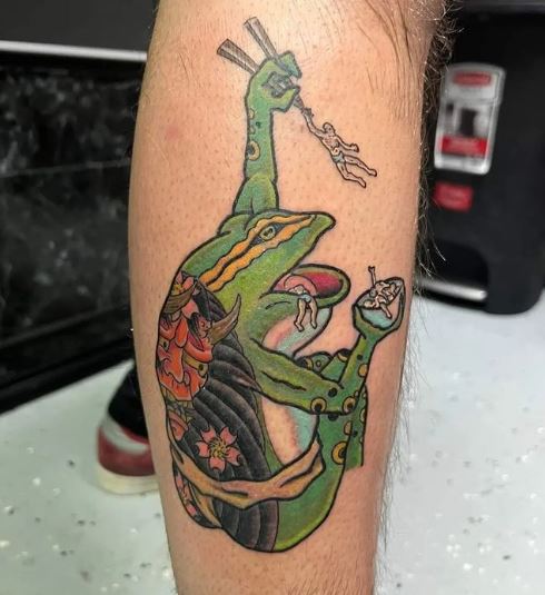 Little frog eating people tattoo