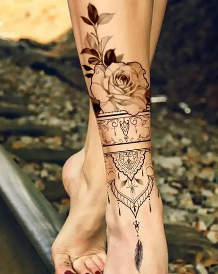 Ornamental Flower Leg Tattoo
