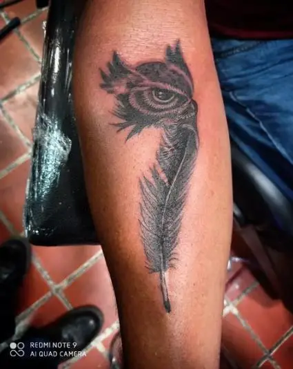 Owl Eye and Feather Tattoo