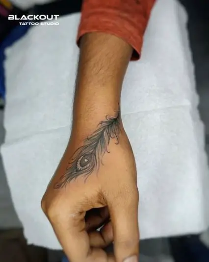 Peacock Feather Tattoo on Hands
