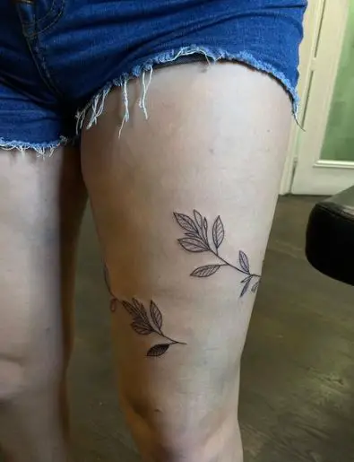Plant Wrap Tattoo Around the Leg