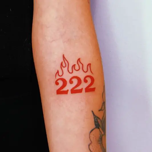 Red 222 Flaming Tattoo on the Forearm